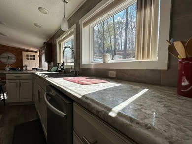 REDUCED!!! Experience ultimate lakeside living on 952 feet of - photo 15