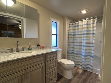 REDUCED!!! Experience ultimate lakeside living on 952 feet of - photo 19