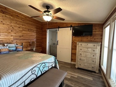 REDUCED!!! Experience ultimate lakeside living on 952 feet of - photo 22