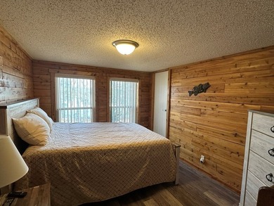 REDUCED!!! Experience ultimate lakeside living on 952 feet of - photo 23