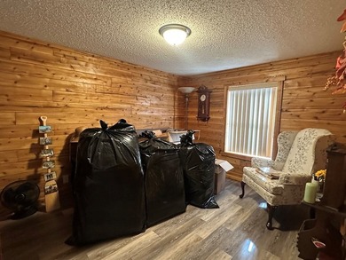 REDUCED!!! Experience ultimate lakeside living on 952 feet of - photo 24