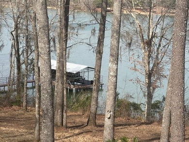 REDUCED!!! Experience ultimate lakeside living on 952 feet of - photo 25