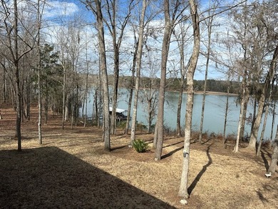 REDUCED!!! Experience ultimate lakeside living on 952 feet of - photo 26