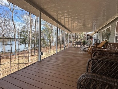 REDUCED!!! Experience ultimate lakeside living on 952 feet of - photo 28