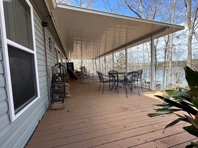REDUCED!!! Experience ultimate lakeside living on 952 feet of - photo 29
