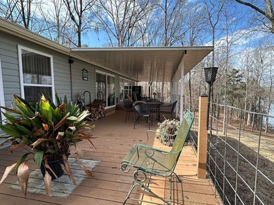 REDUCED!!! Experience ultimate lakeside living on 952 feet of - photo 31