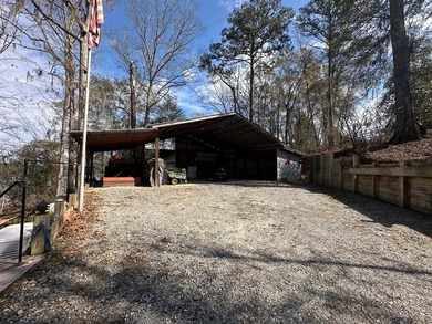 REDUCED!!! Experience ultimate lakeside living on 952 feet of - photo 32