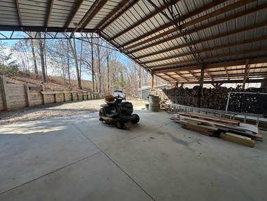 REDUCED!!! Experience ultimate lakeside living on 952 feet of - photo 34