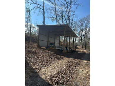 REDUCED!!! Experience ultimate lakeside living on 952 feet of - photo 36