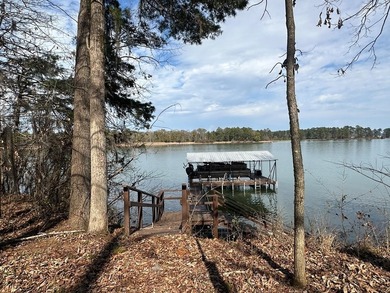 REDUCED!!! Experience ultimate lakeside living on 952 feet of - photo 39