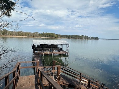 REDUCED!!! Experience ultimate lakeside living on 952 feet of - photo 40