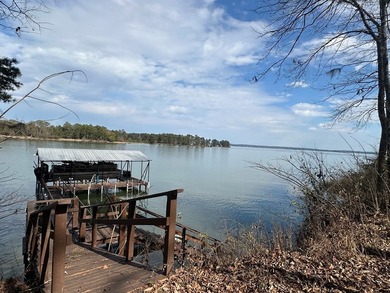 REDUCED!!! Experience ultimate lakeside living on 952 feet of - photo 41
