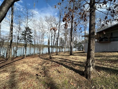 REDUCED!!! Experience ultimate lakeside living on 952 feet of - photo 43