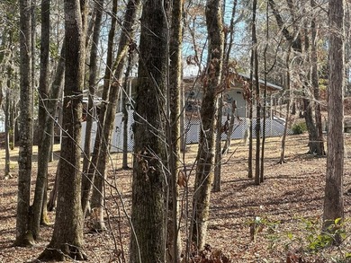 REDUCED!!! Experience ultimate lakeside living on 952 feet of - photo 45