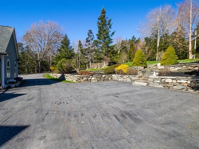 Set on Maine's bold coast, this four-bedroom - photo 11