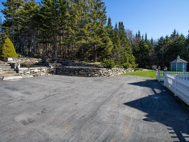Set on Maine's bold coast, this four-bedroom - photo 12