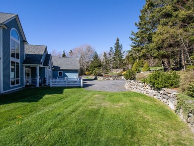Set on Maine's bold coast, this four-bedroom - photo 13