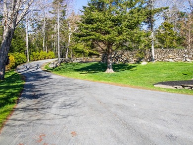 Set on Maine's bold coast, this four-bedroom - photo 15