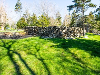 Set on Maine's bold coast, this four-bedroom - photo 18