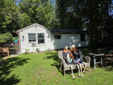 This snug little home would fit right into a storybook, with 2 - Lake Home Sale Pending in Griswold, Connecticut