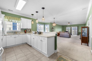 Welcome to refined coastal living in this elegant 3-bedroom