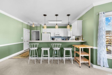 Welcome to refined coastal living in this elegant 3-bedroom