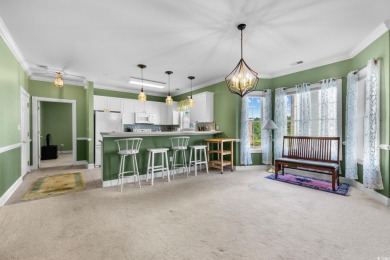 Welcome to refined coastal living in this elegant 3-bedroom