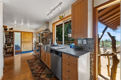 Perched on a serene hillside overlooking the Pacific Ocean and - photo 12
