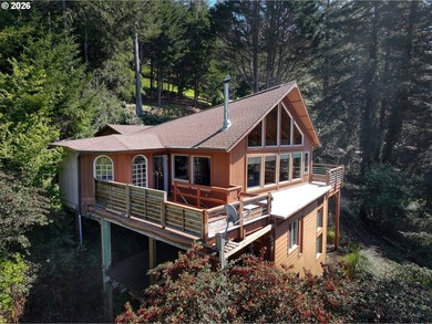 Perched on a serene hillside overlooking the Pacific Ocean and - photo 31