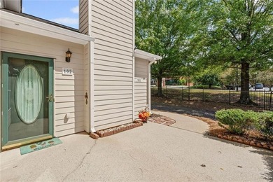 Garden condo located just outside of downtown Cumming in a quiet