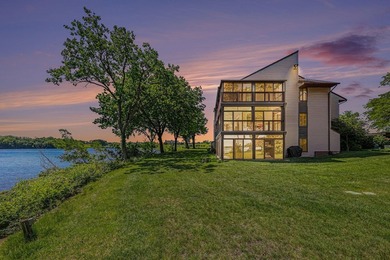 Step into waterfront tranquility in this stunningly located - photo 1
