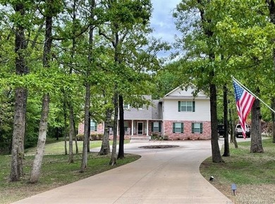Tucked away in the private gated community of Texoma Landing - photo 1
