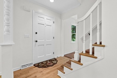 Situated on a double wooded lot directly across from Long Lake - photo 3