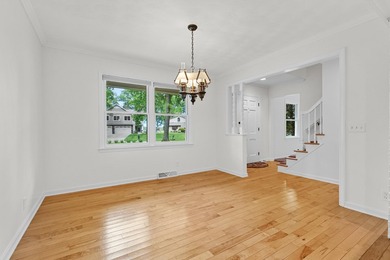 Situated on a double wooded lot directly across from Long Lake - photo 5