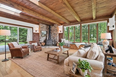 Situated on a double wooded lot directly across from Long Lake - photo 9