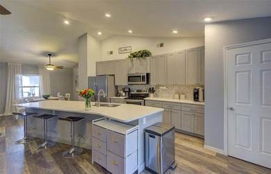 BRAND-NEW ROOF - TWO TRUE PRIMARY SUITES - ACCESSIBLE LIVING - - photo 6