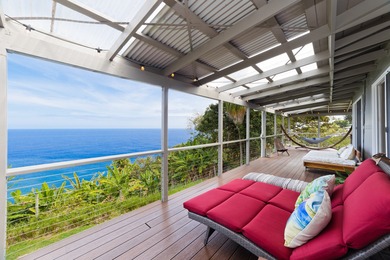 Be amazed by vast ocean and Laupahoehoe Point views from this - photo 1