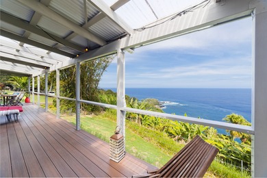 Be amazed by vast ocean and Laupahoehoe Point views from this - photo 2