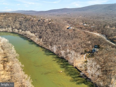 Discover the potential of this 4.9+/- acre waterfront parcel on - photo 3