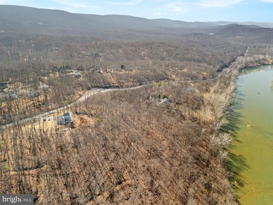 Discover the potential of this 4.9+/- acre waterfront parcel on - photo 6