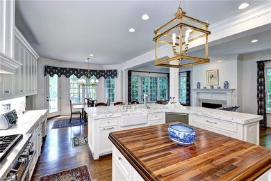 Stately and impressive golf-front brick beauty in Governor's - photo 1