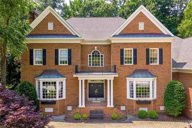 Stately and impressive golf-front brick beauty in Governor's - photo 3