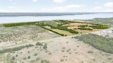 Prime 110 acre tract with direct lake frontage, offering - photo 1