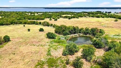 Prime 110 acre tract with direct lake frontage, offering - photo 6