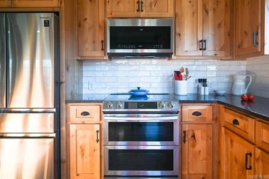 Situated on the banks of the beautiful, clear Caddo River, this - photo 17