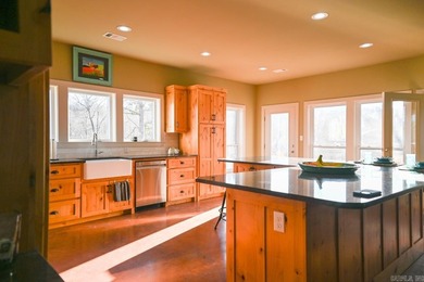 Situated on the banks of the beautiful, clear Caddo River, this - photo 18