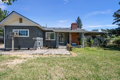 This home sits on a .36 acre corner lot in Lowell. Home has two - photo 1