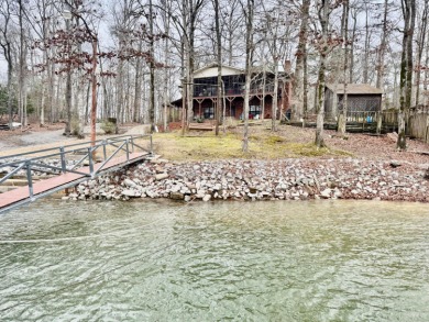 Tucked in a cove with main channel views of a popular sunset - Lake Home For Sale in Arley, Alabama