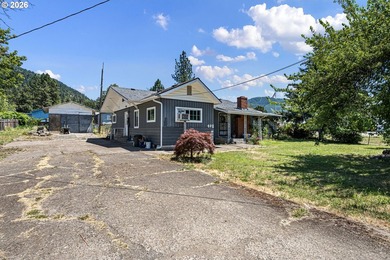 This home sits on a .36 acre corner lot in Lowell. Home has two - photo 2