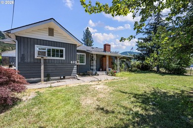 This home sits on a .36 acre corner lot in Lowell. Home has two - photo 4